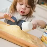 Engaging Toddlers with Cornmeal Sensory Play
